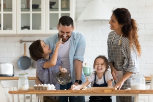 young family happy after knowing asset management vs wealth management