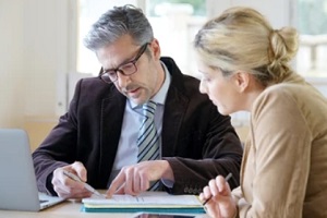 financial advisor with business owner